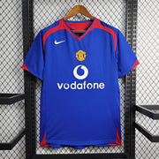 Manchester United Away Jersey 2005/06 front view in royal blue with red detailing
