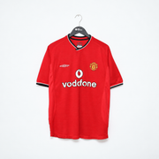 Manchester United Home Jersey 2000/02 front view in red with black and white trim, club crest and central sponsor