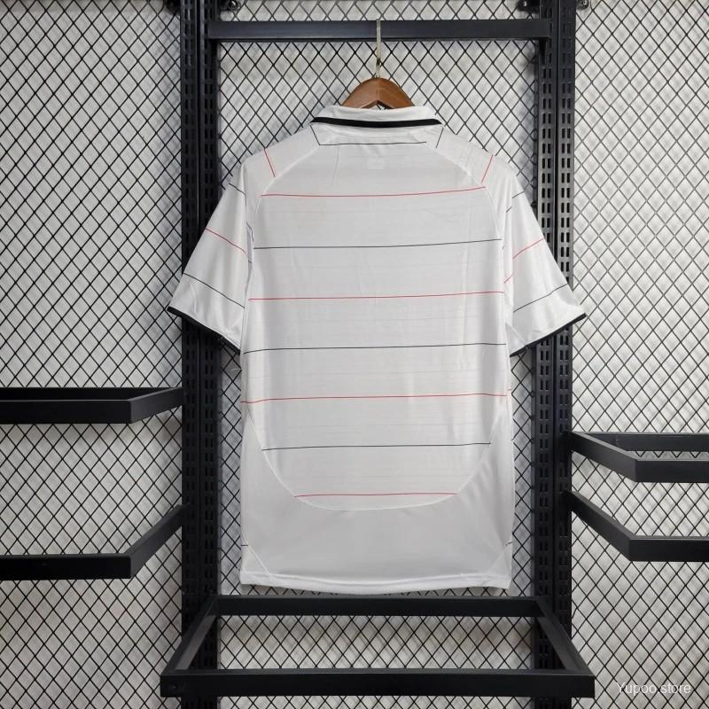 Back view of the Manchester United Third Jersey 2003/04 in white with fine horizontal pinstripes and fold-over collar