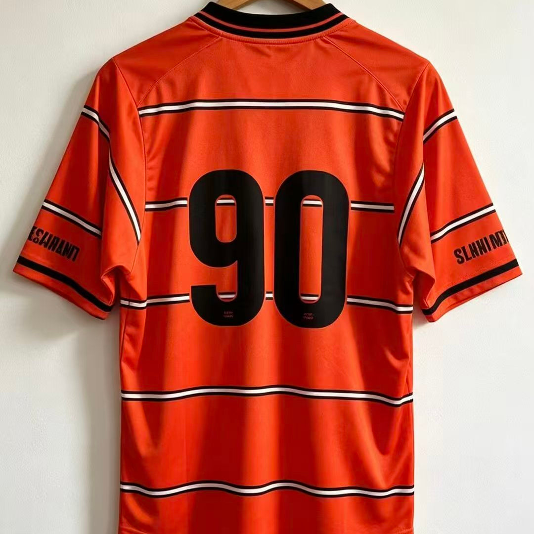Netherlands x Travis Scott Special Edition Jersey 2026 back view in orange with black horizontal stripes and upper back detailing