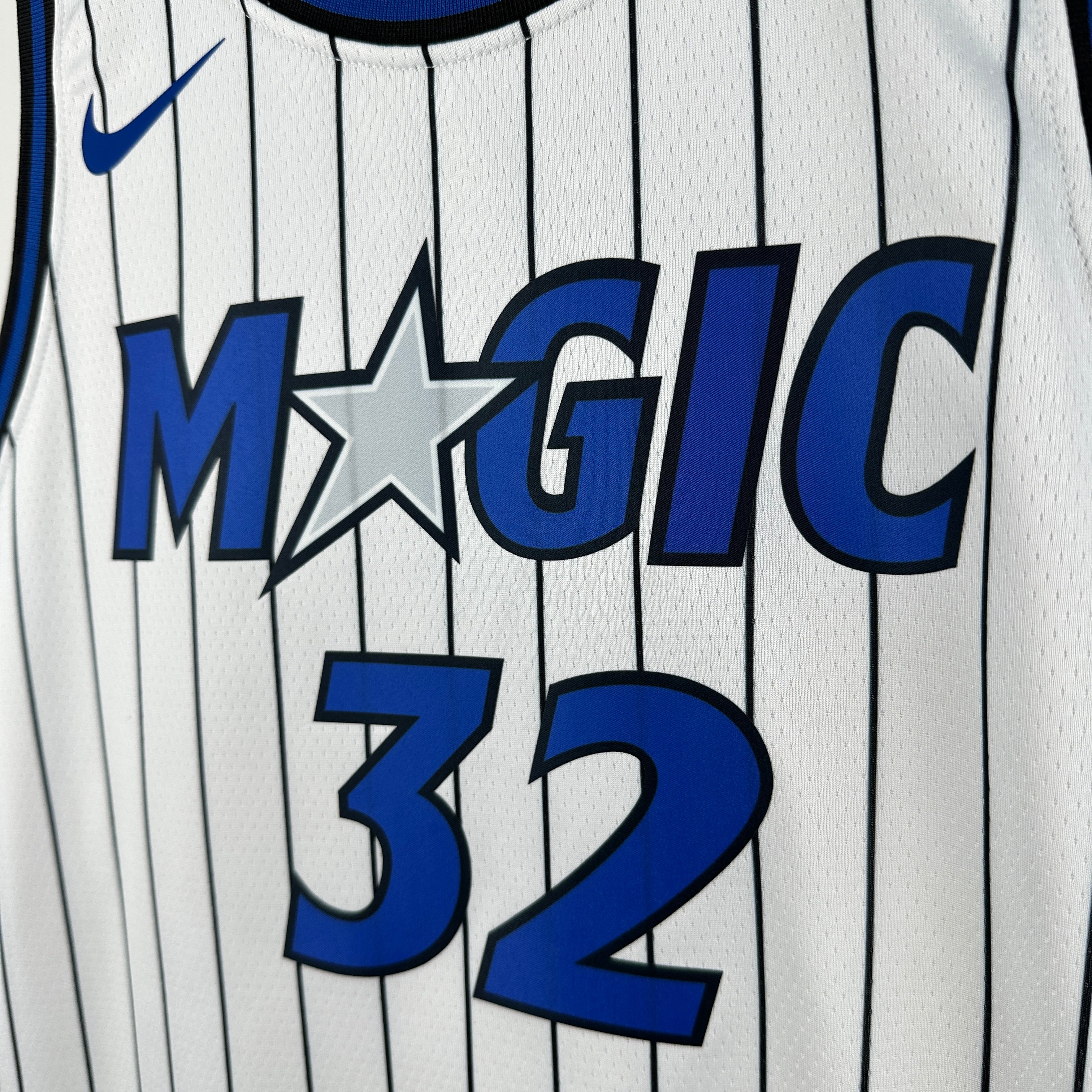 Orlando Magic 2025/26 home white swingman jersey Shaquille O’Neal number 32 pinstripe front and back view