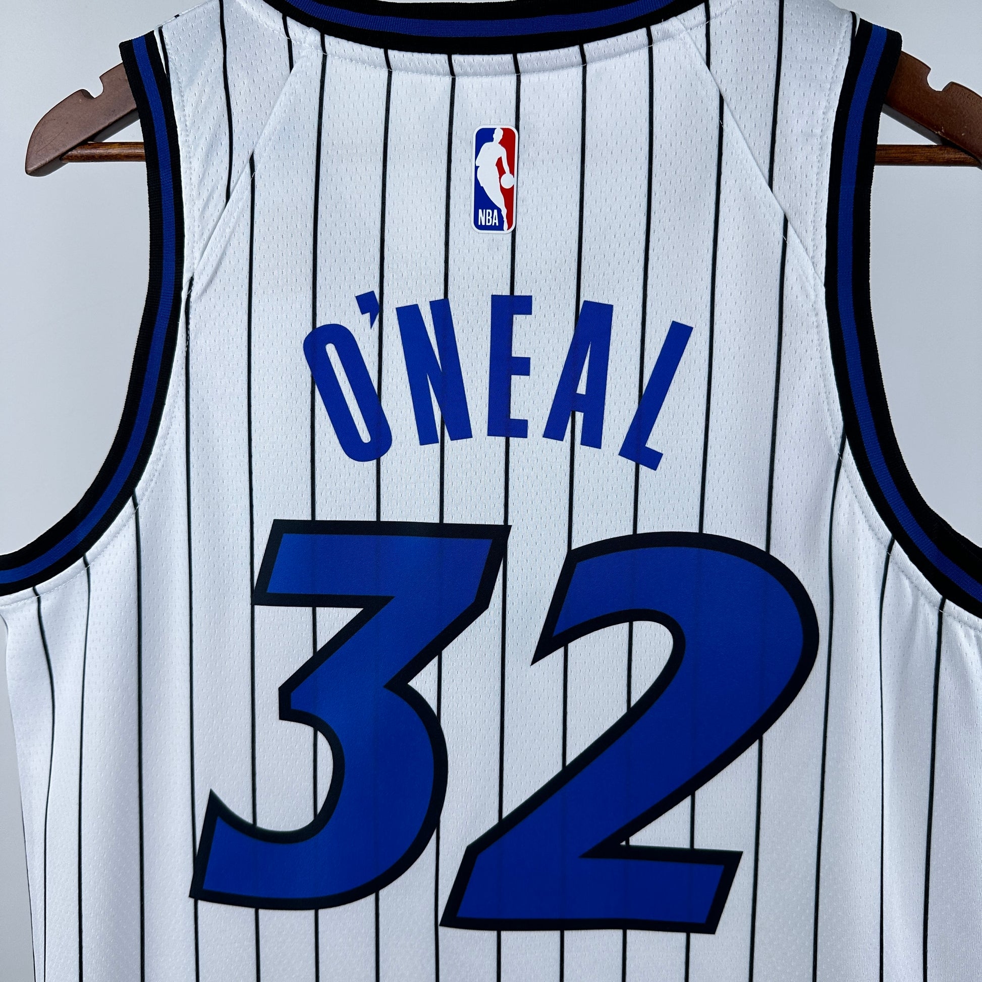 Orlando Magic 2025/26 home white swingman jersey Shaquille O’Neal number 32 pinstripe front and back view