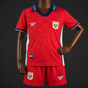 Panama Home Jersey 2026 Kids Set front view with red jersey and matching shorts