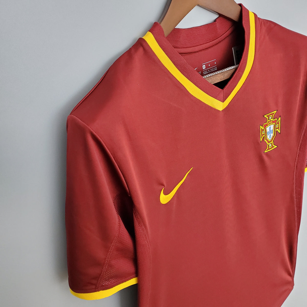 Portugal Home Jersey 2000 angled front view showing the red design, yellow trim and Portugal crest