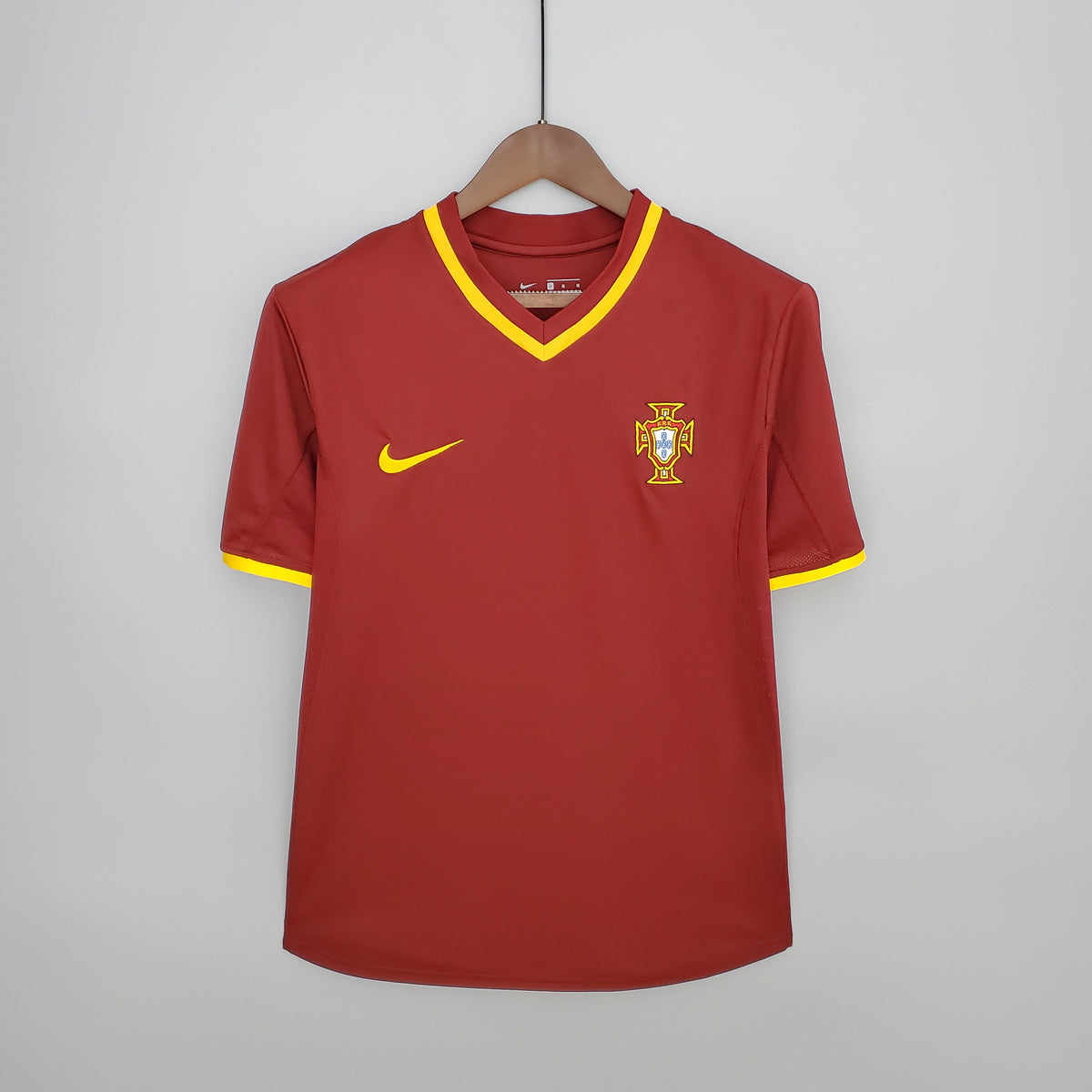 Portugal Home Jersey 2000 front view in deep red with yellow trim and Portugal crest