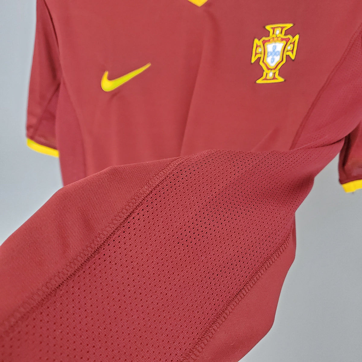 Portugal Home Jersey 2000 side panel detail showing the red body and underarm construction