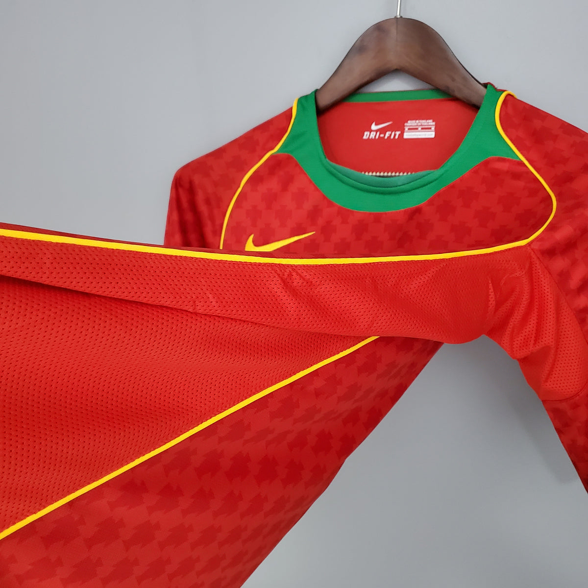 Portugal Home Jersey 2004 angled front detail with shoulder piping
