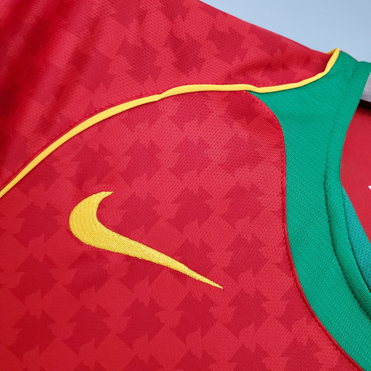 Portugal Home Jersey 2004 yellow chest swoosh close-up