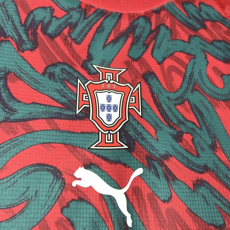 Portugal World Cup Pre-Match Jersey 2026 front view with red and green graphic design