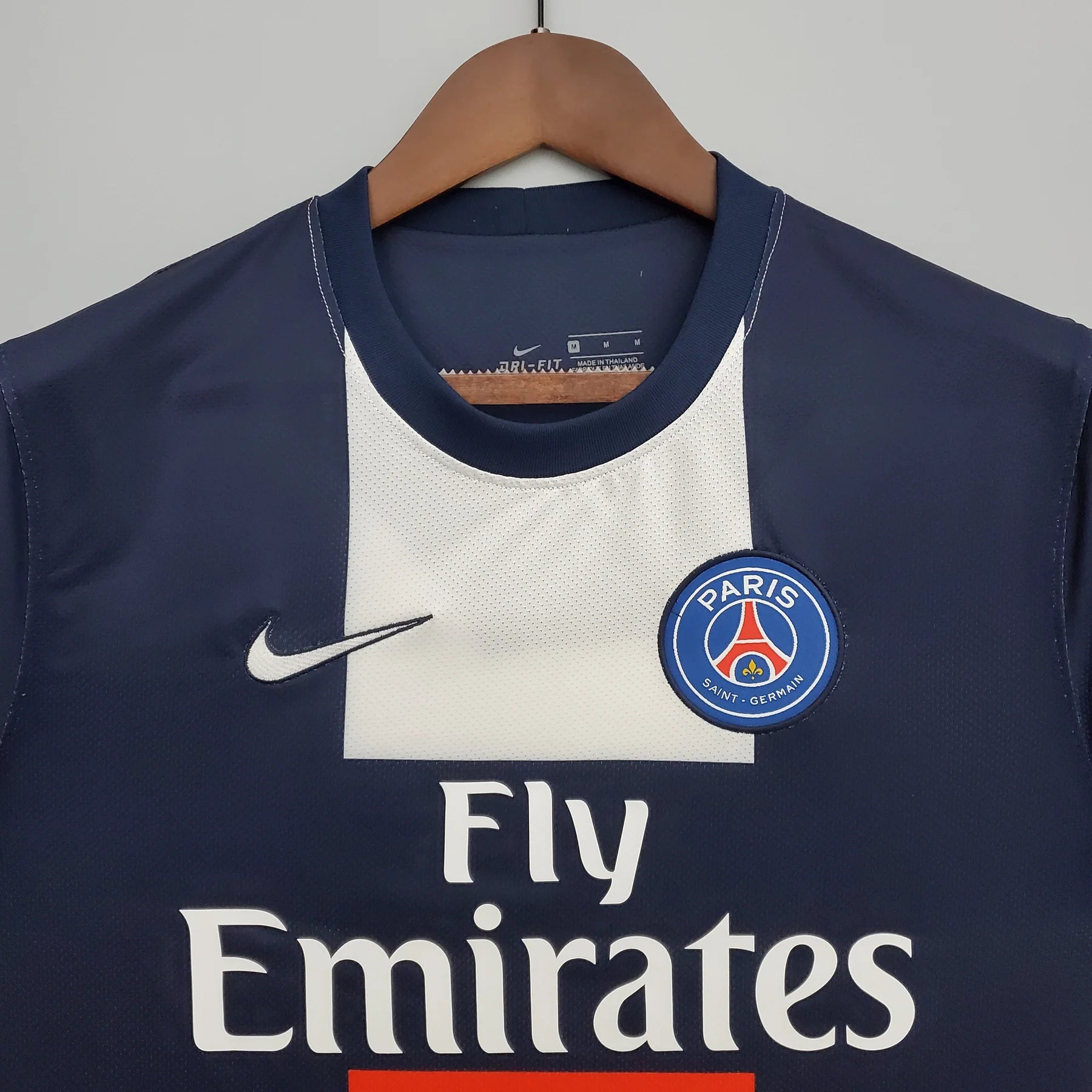 PSG Home Jersey 2013/14 crest detail with Nike logo and white chest panel
