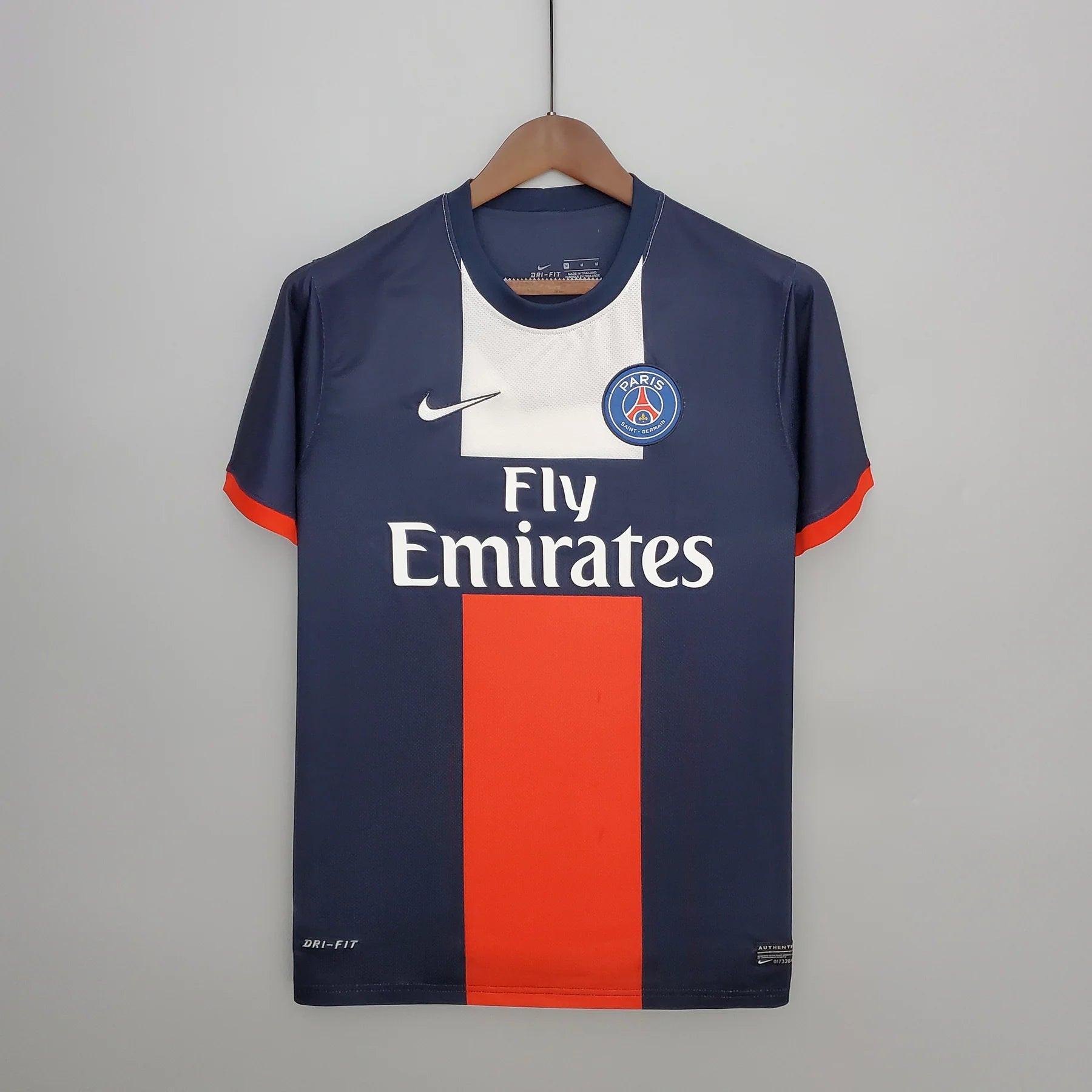 PSG Home Jersey 2013/14 front view with navy base and red centre stripe