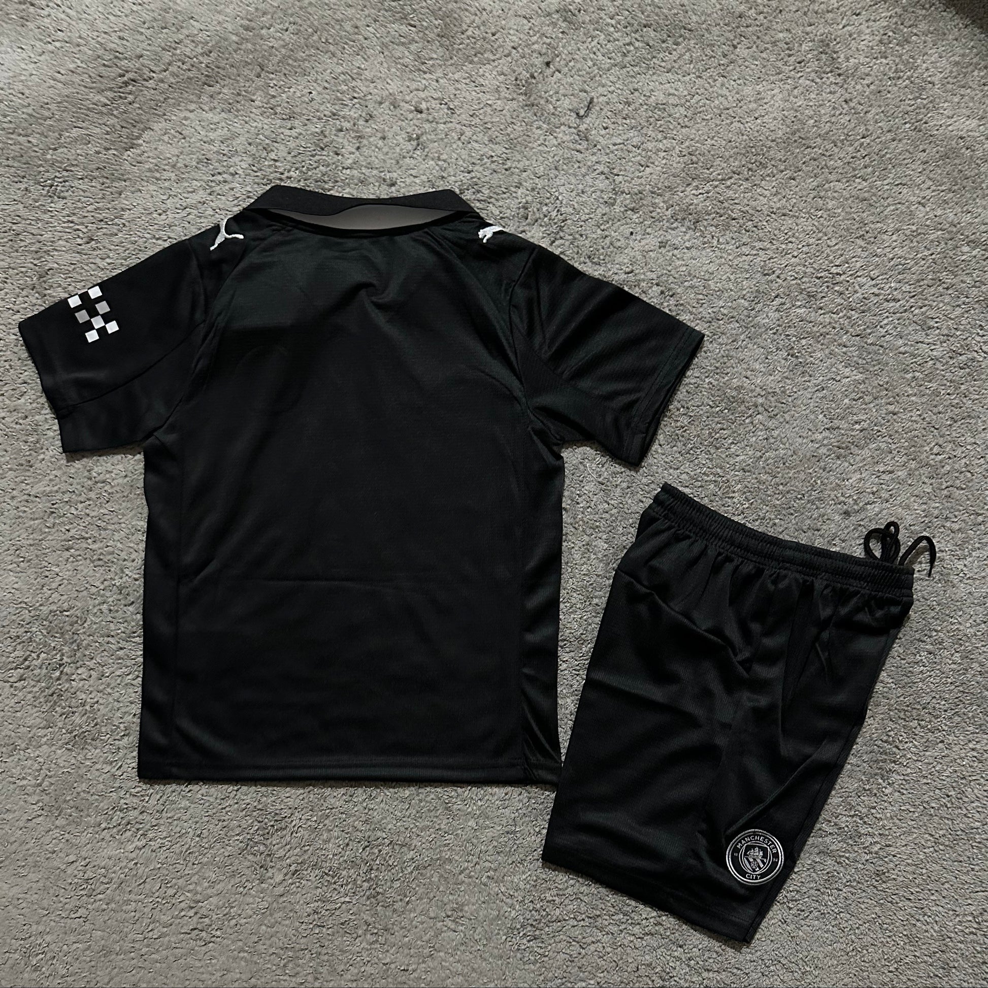 Puma Manchester City away kit 2025 26 kids back view youth football set
