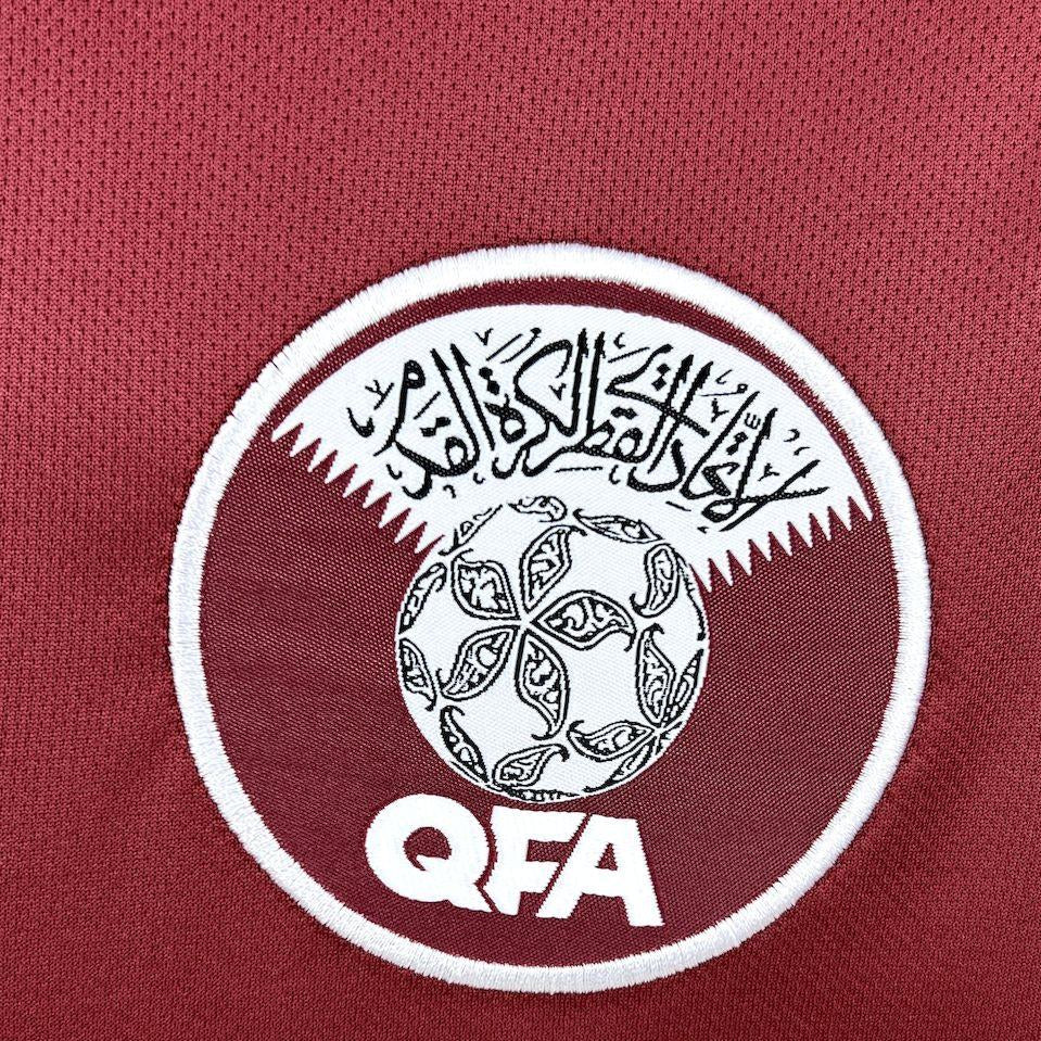 qatar-home-kit-2026-crest-detail

