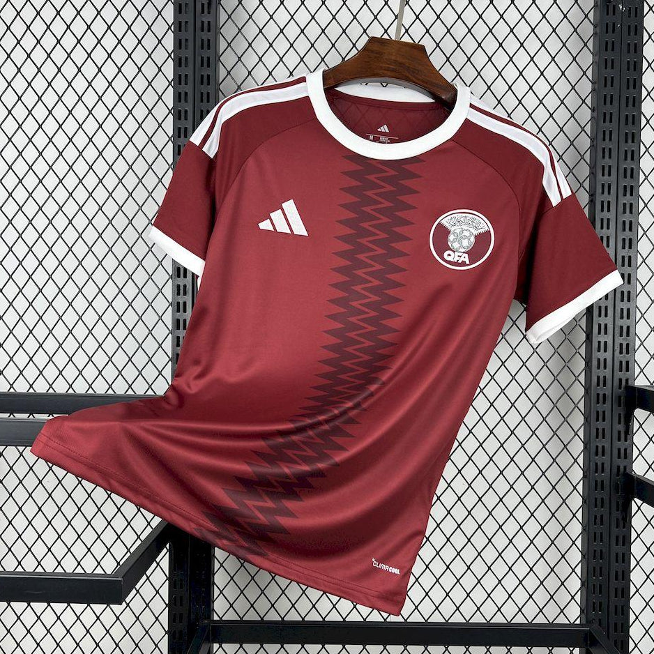 Qatar home kit 2026 front view maroon World Cup jersey
