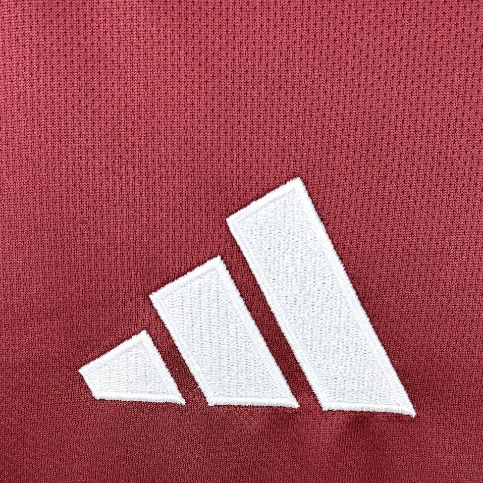 qatar-home-kit-2026-logo-detail
