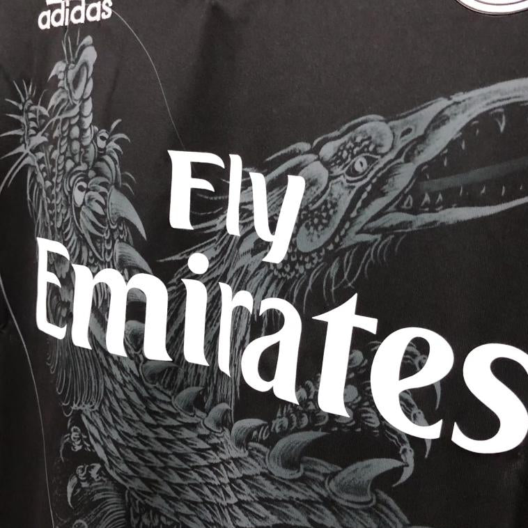 Real Madrid front detail on black dragon jersey
