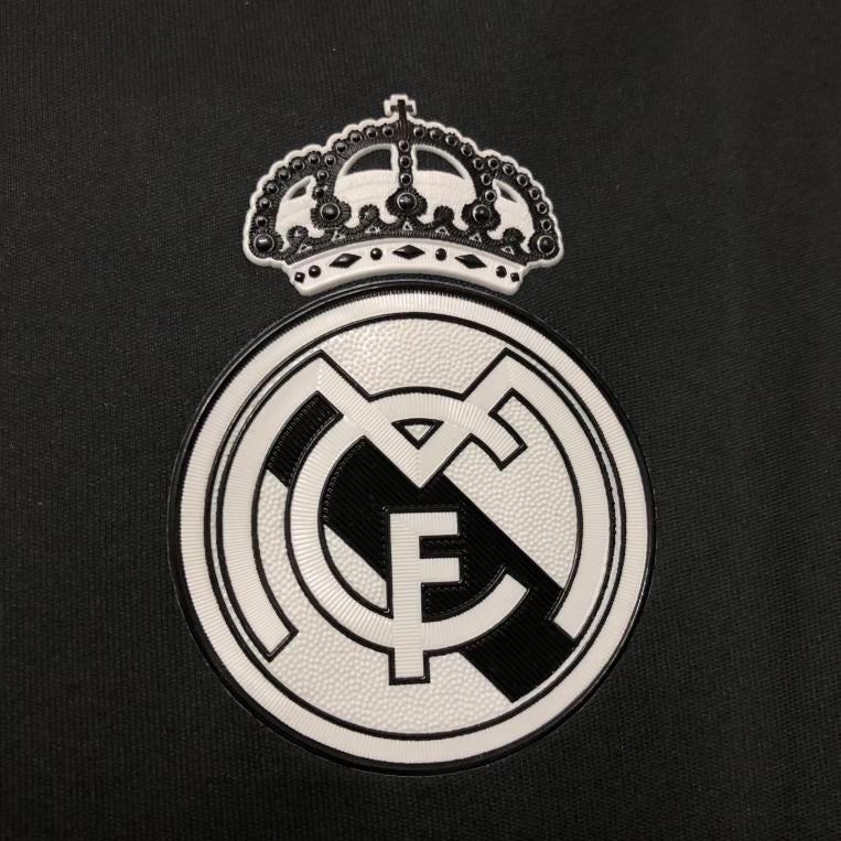 Real Madrid detail on black dragon jersey
