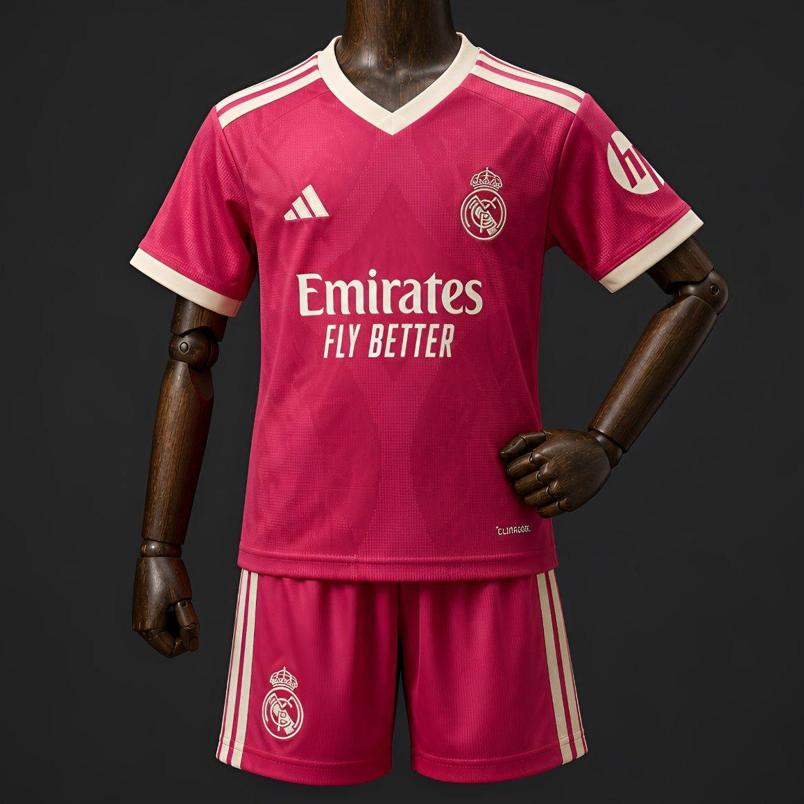 Real Madrid Third Jersey 2026 Kids Set front view with pink jersey and matching shorts