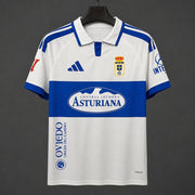Real Oviedo Away Jersey 2026/27 front view with white base and blue chest band