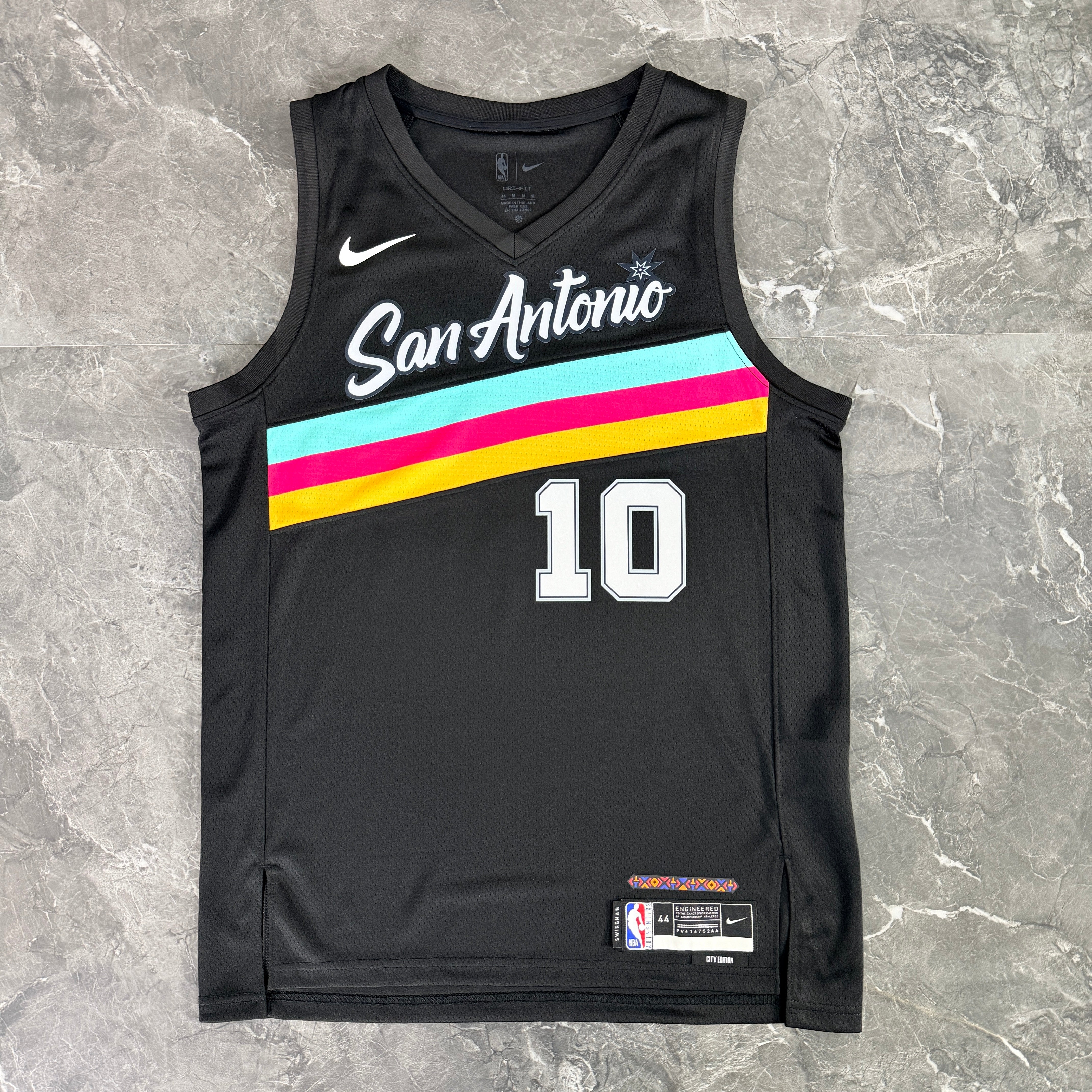 San Antonio Spurs 2025/26 City Edition Jeremy Sochan jersey black Fiesta colors number 10 front view