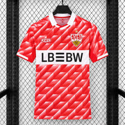 Stuttgart Champions League Away Jersey 2026/27 front view in red with geometric pattern, white collar, Stuttgart crest and LBBW sponsor