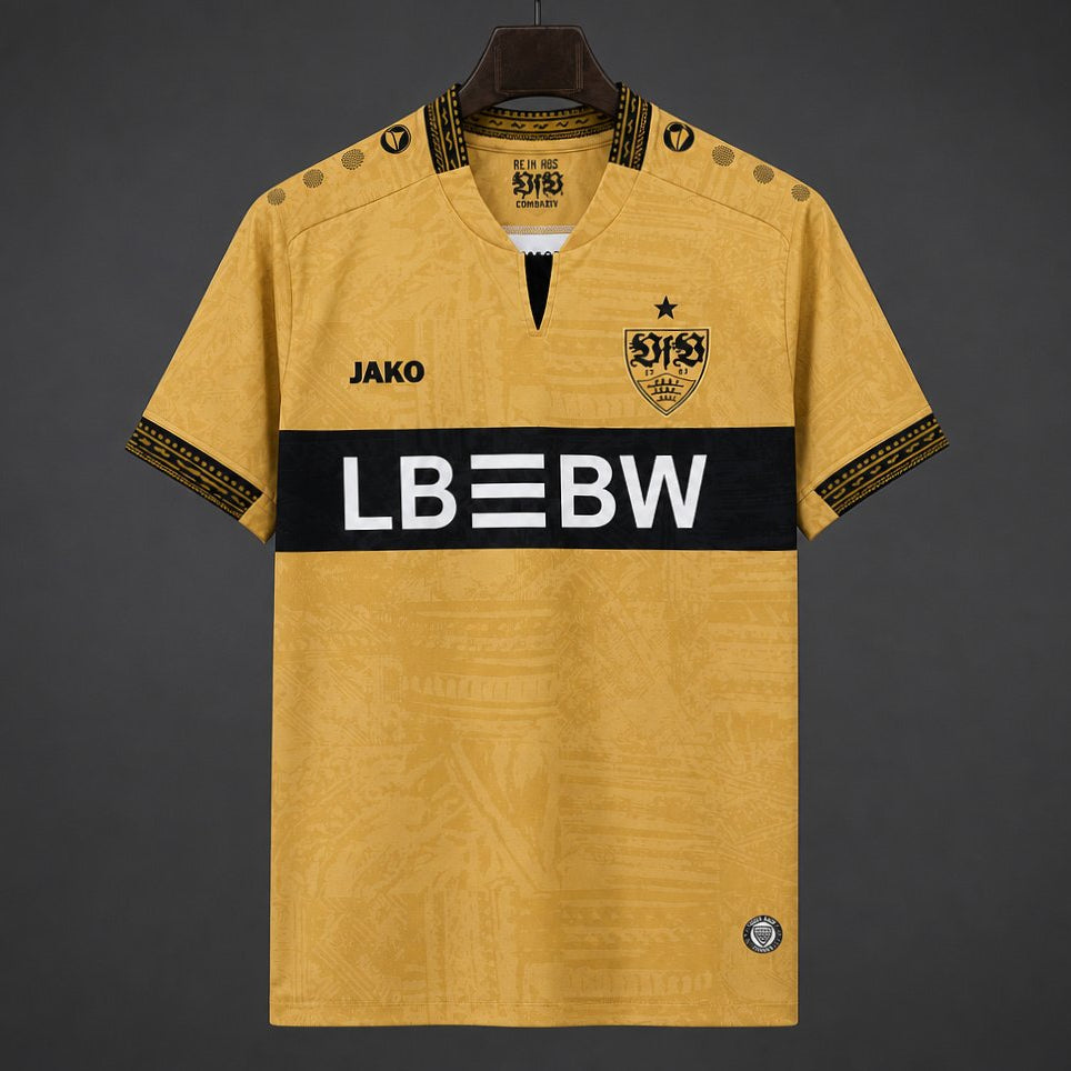 Stuttgart Third Jersey 2026/27 front view in gold with tonal graphics, black chest band, club crest and LBBW sponsor