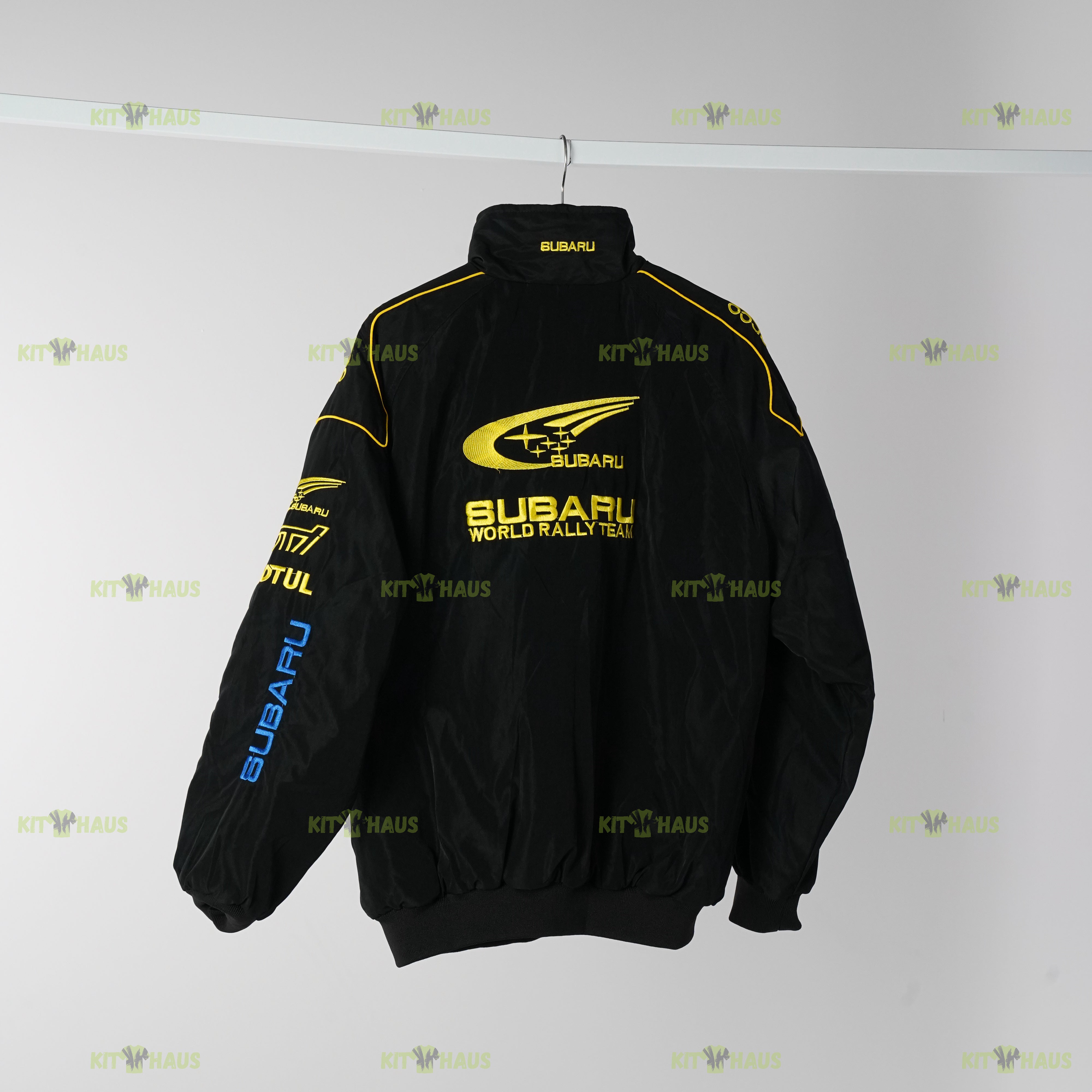 Subaru World Rally Team jacket back view with large Subaru rally logo