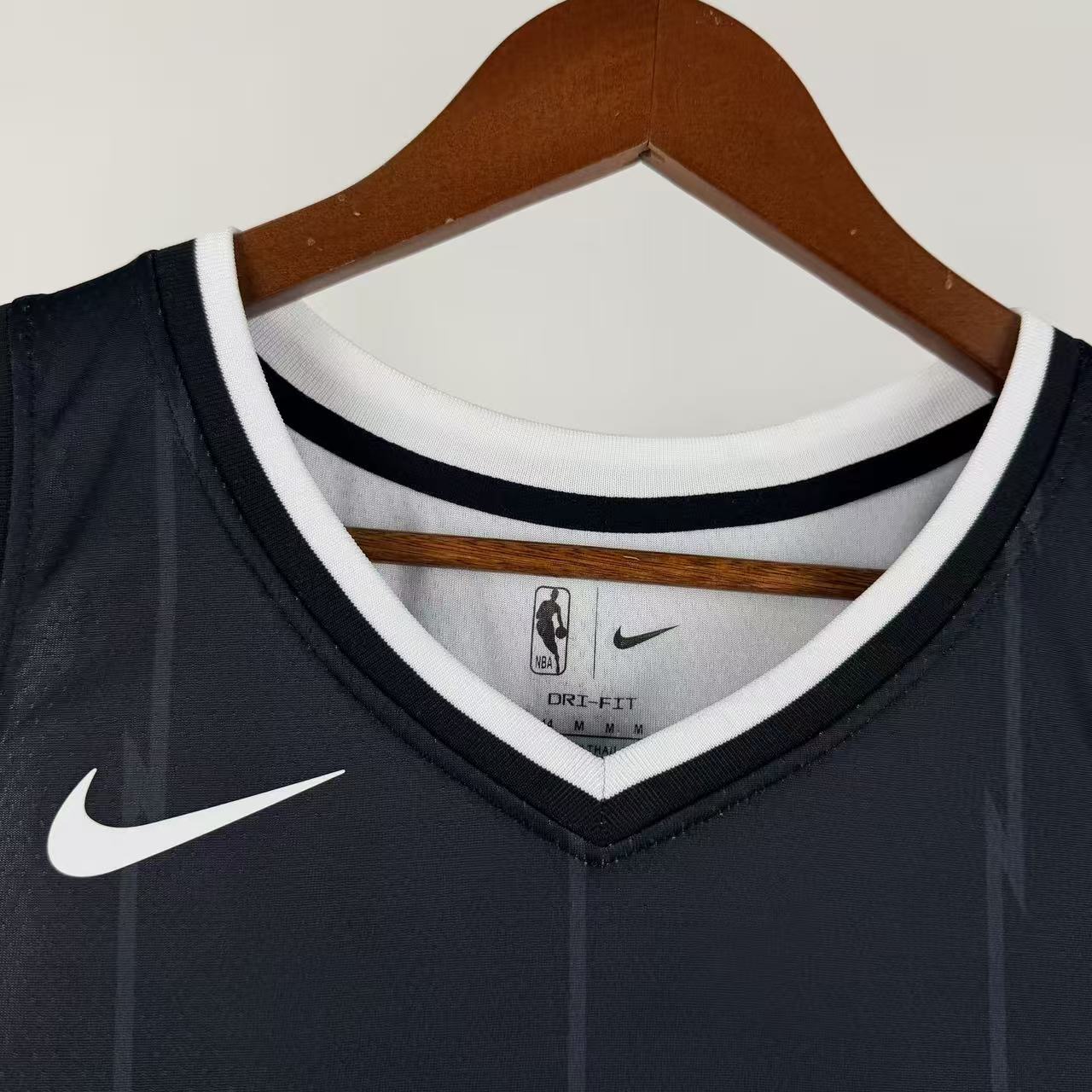 Toronto Raptors 2025/26 City Edition Vince Carter jersey black dinosaur logo front view