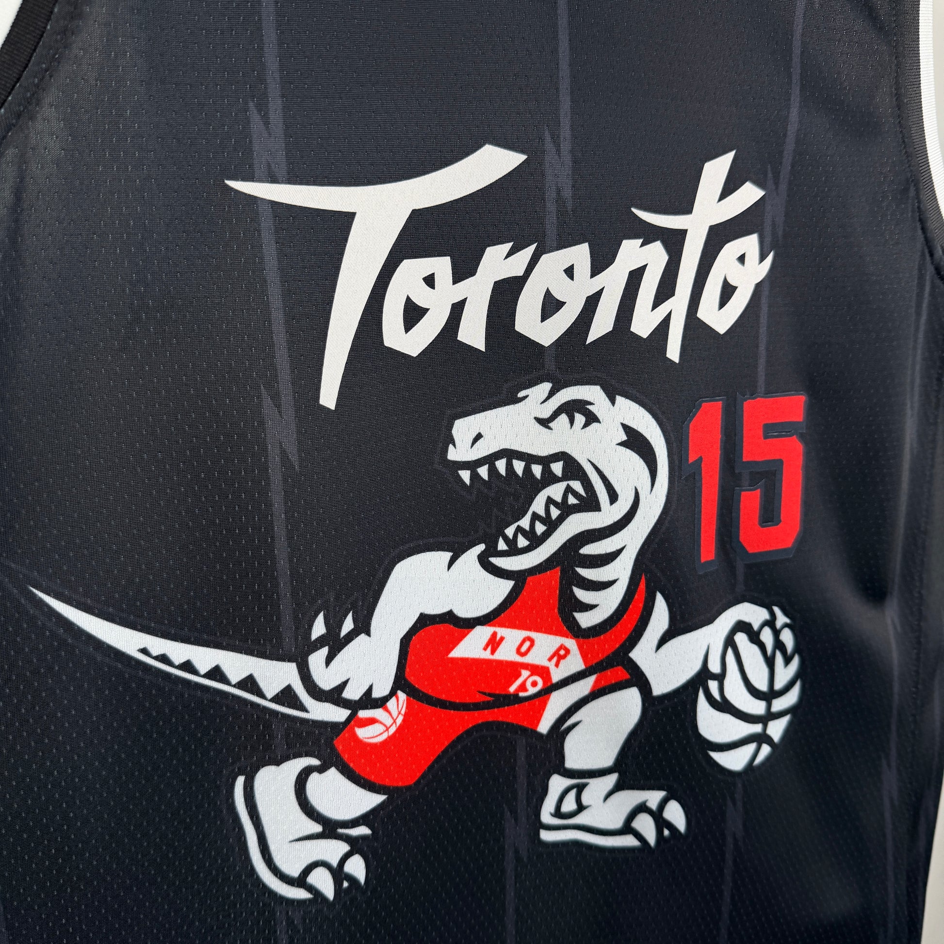 Toronto Raptors 2025/26 City Edition Vince Carter jersey black dinosaur logo front view
