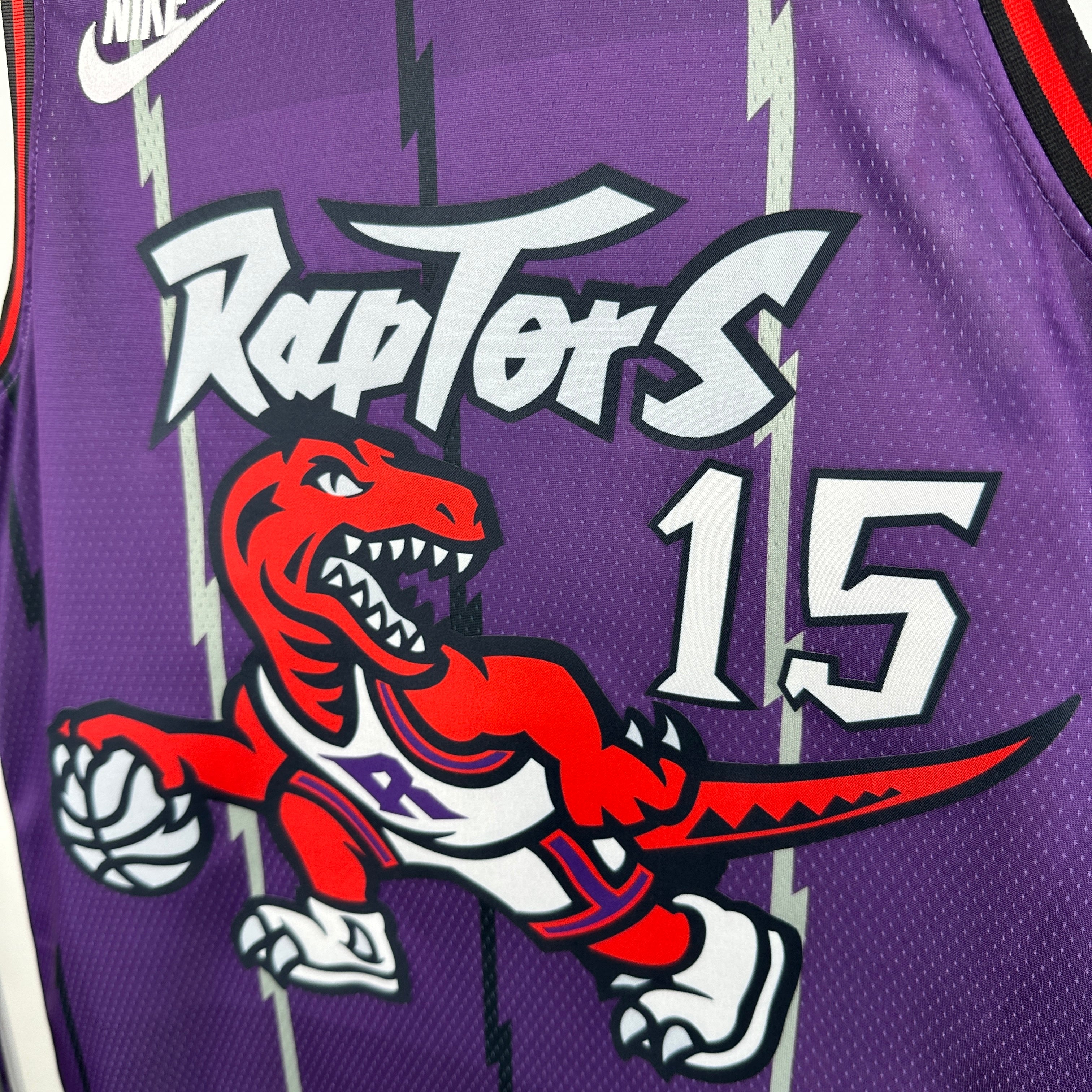 Toronto Raptors 2025/26 purple retro swingman jersey Vince Carter number 15 dinosaur design front and back view