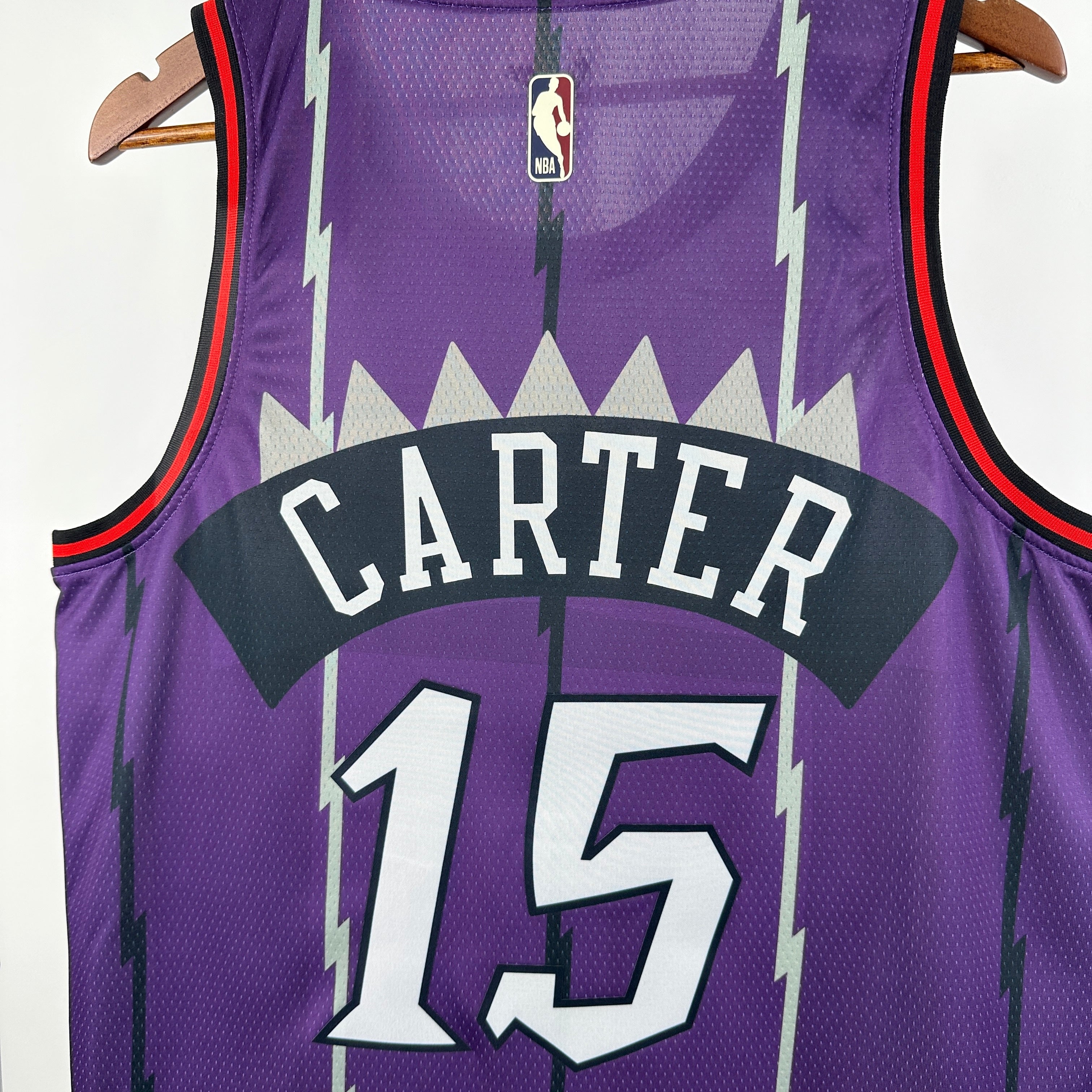 Toronto Raptors 2025/26 purple retro swingman jersey Vince Carter number 15 dinosaur design front and back view