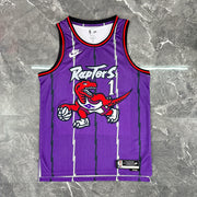 Toronto Raptors 2025/26 retro purple swingman jersey Tracy McGrady number 1 front and back view