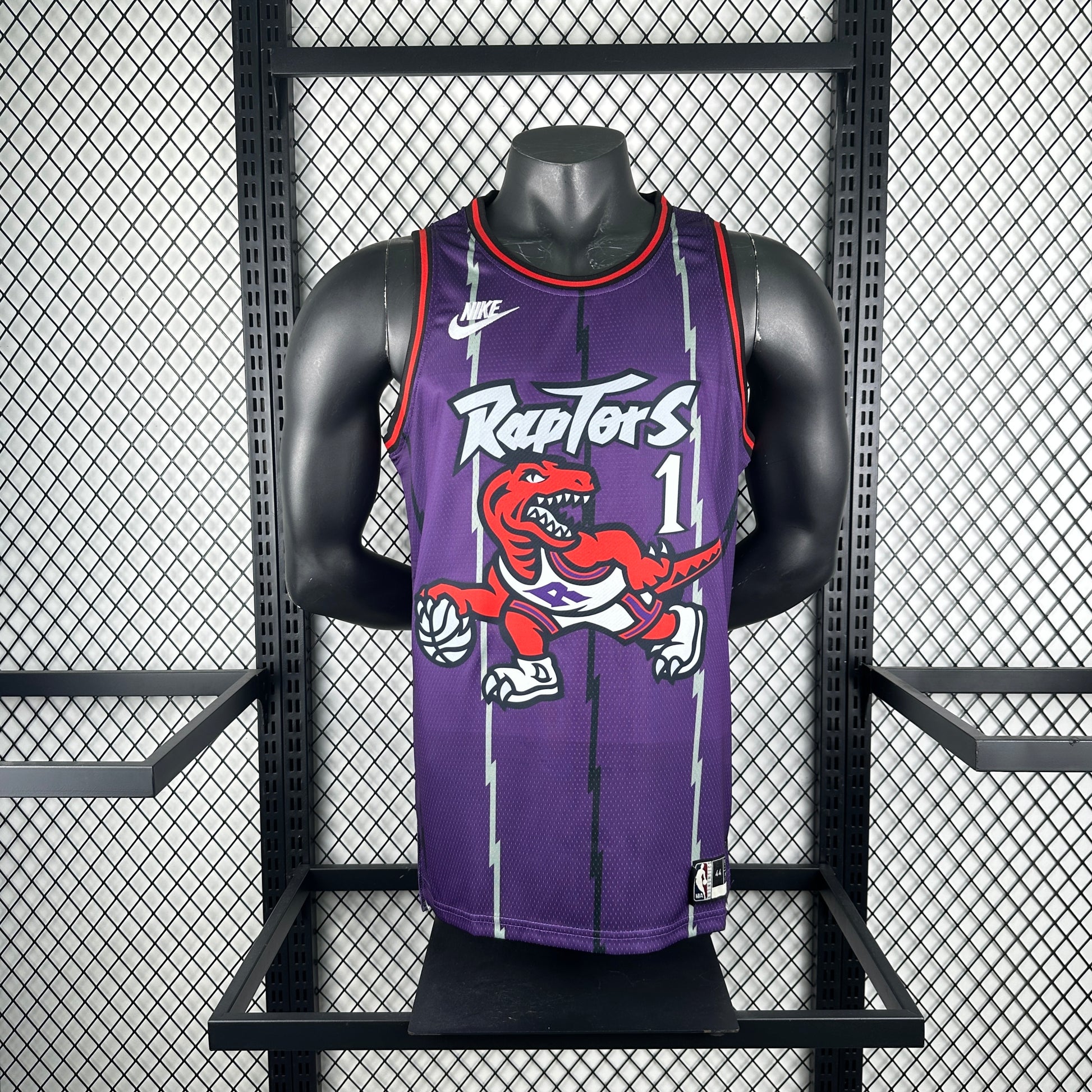 Toronto Raptors 2025/26 retro purple swingman jersey Tracy McGrady number 1 front and back view