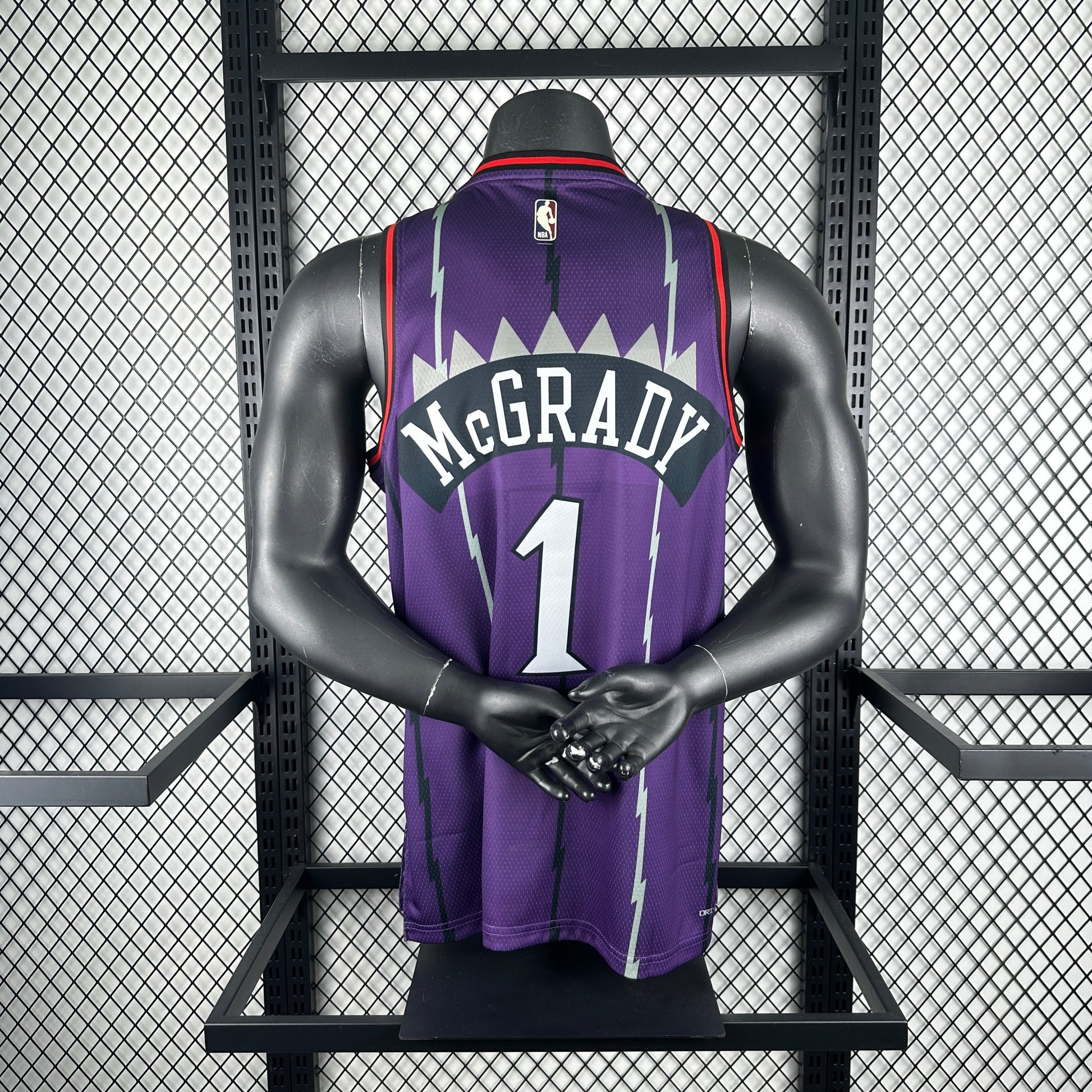 Toronto Raptors 2025/26 retro purple swingman jersey Tracy McGrady number 1 front and back view