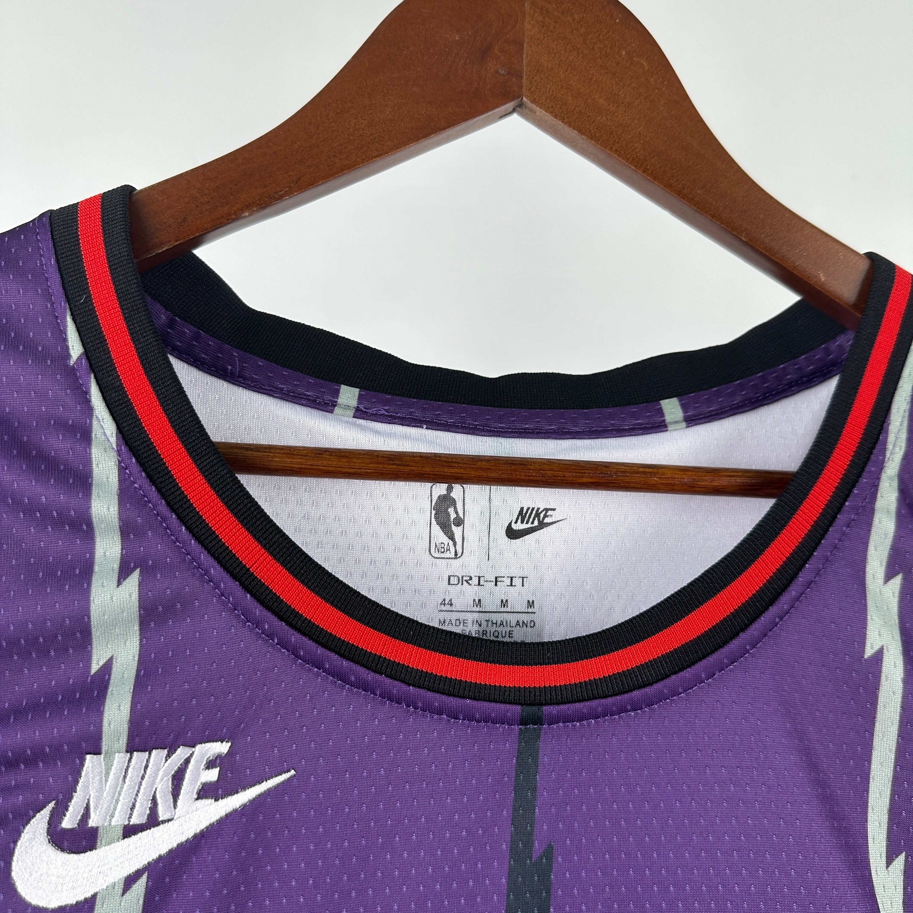 Toronto Raptors 2025/26 retro purple swingman jersey Tracy McGrady number 1 front and back view