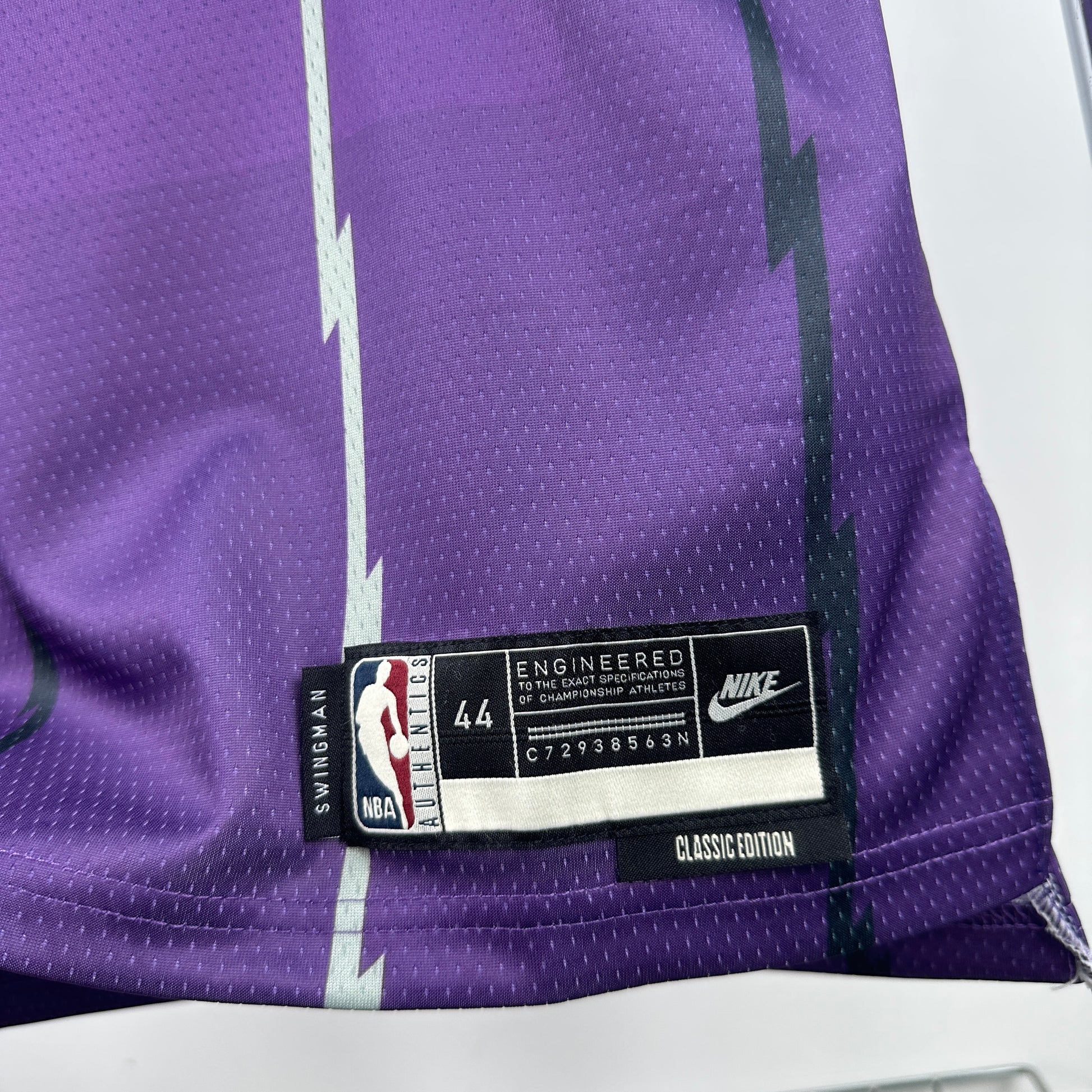 Toronto Raptors 2025/26 retro purple swingman jersey Tracy McGrady number 1 front and back view