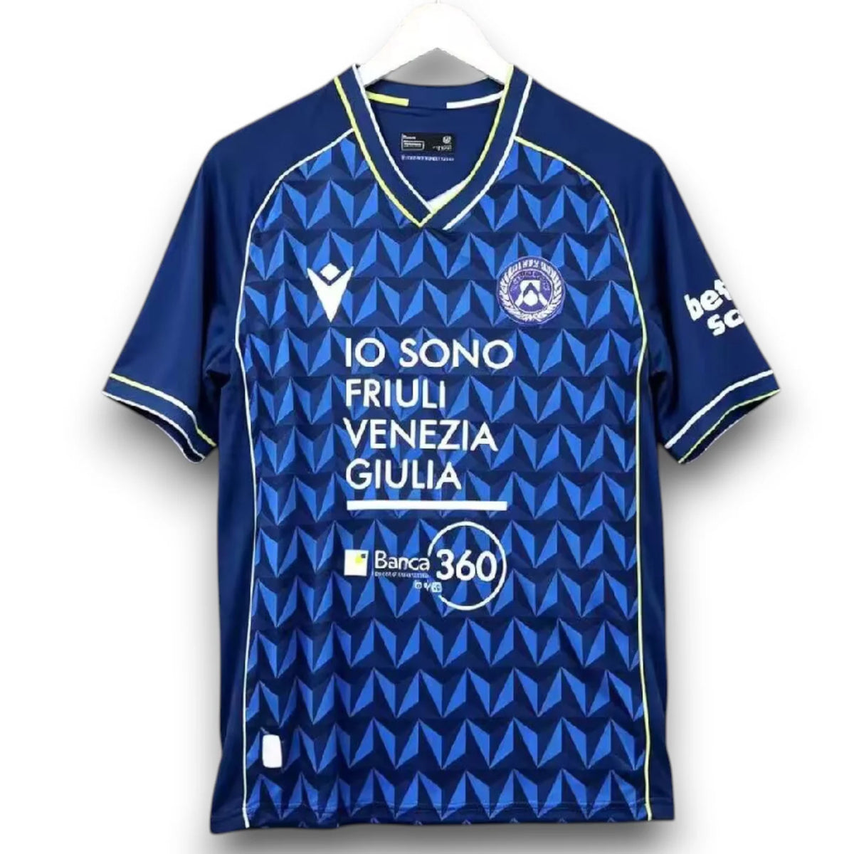 Udinese Away Jersey 2026/27 front view in deep blue with geometric pattern, lime accents, club crest and sponsor graphics