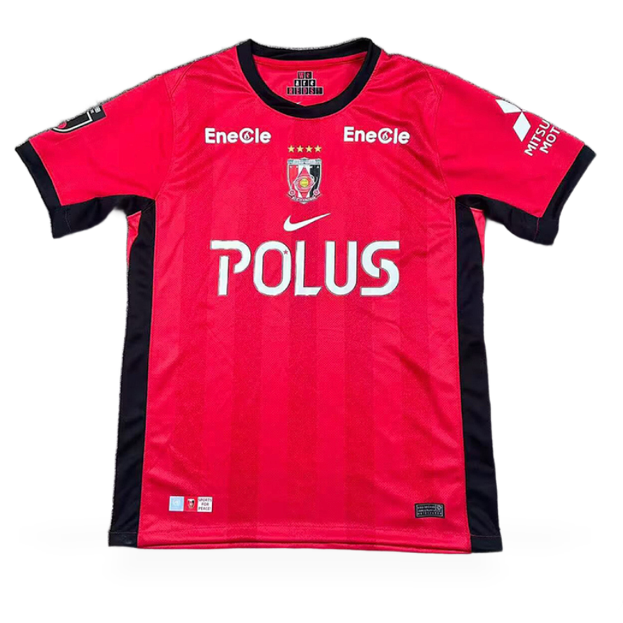 Urawa Red Diamonds Home Jersey 2026/27 front view in red with black side panels, club crest and POLUS sponsor