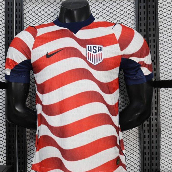 USA 2026 World Cup home jersey red white striped football shirt front view player
