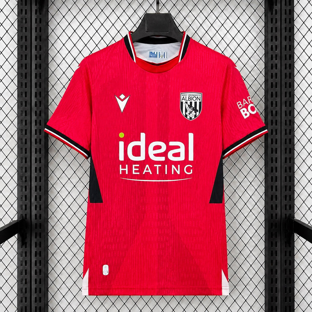 West Bromwich Albion Away Jersey 2026/27 front view in red with black side panels, club crest and Ideal Heating sponsor