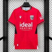 West Bromwich Albion Away Jersey 2026/27 front view in red with black side panels, club crest and Ideal Heating sponsor