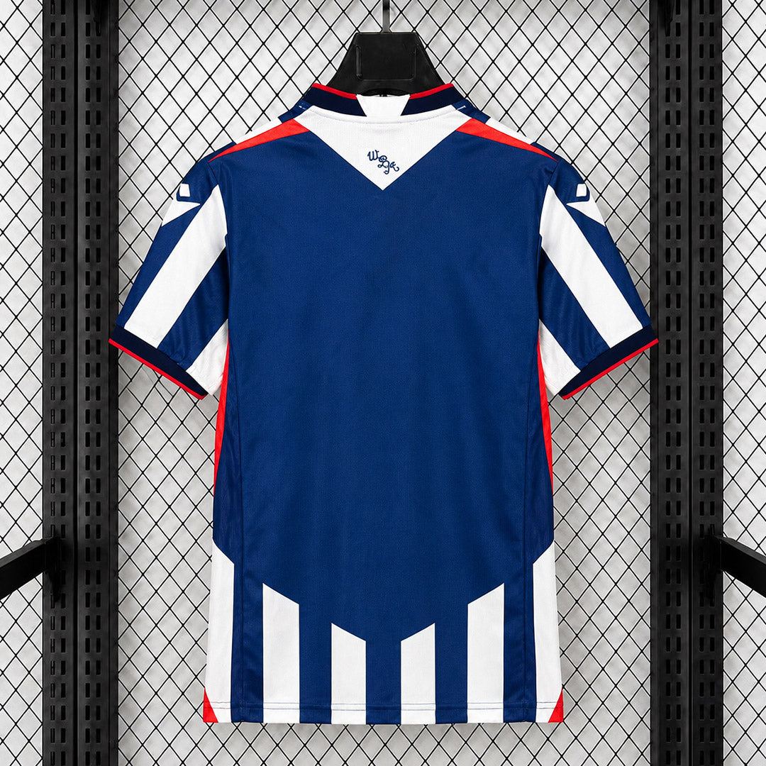 West Bromwich Albion Home Jersey 2026/27 back view in navy with white lower stripes and red shoulder details
