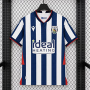 West Bromwich Albion Home Jersey 2026/27 front view with navy and white vertical stripes, red accents, club crest and Ideal Heating sponsor