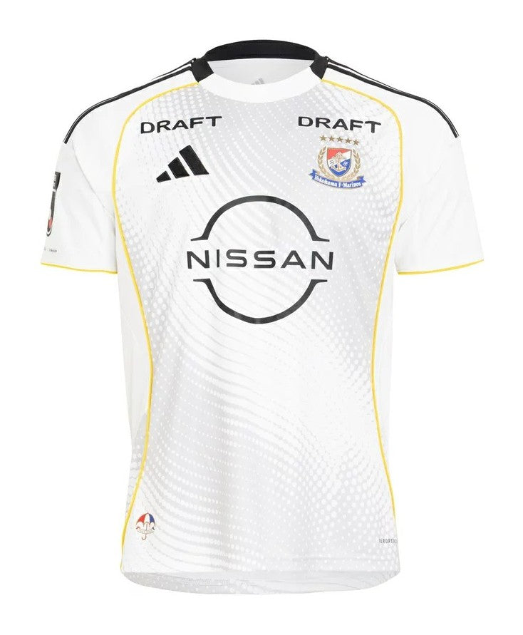 Yokohama F. Marinos Away Jersey 2026/27 front view in white with tonal graphics, yellow piping, club crest and Nissan sponsor