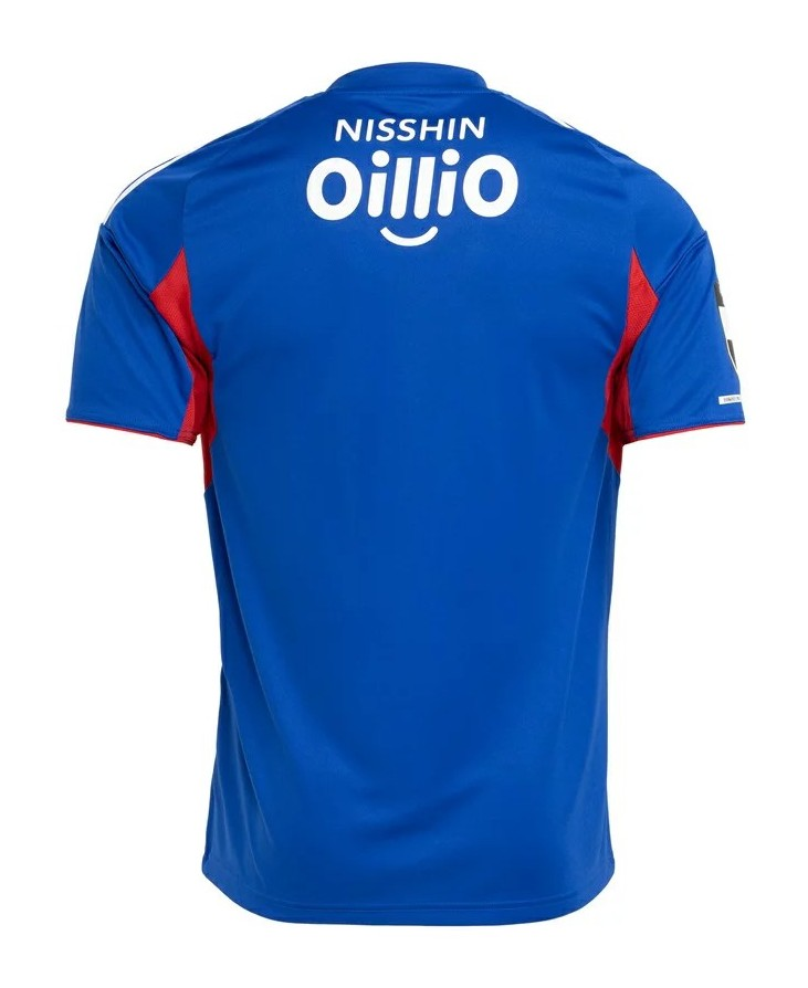 Yokohama F. Marinos Home Jersey 2026/27 back view in blue with red side panels and Nisshin Oillio sponsor