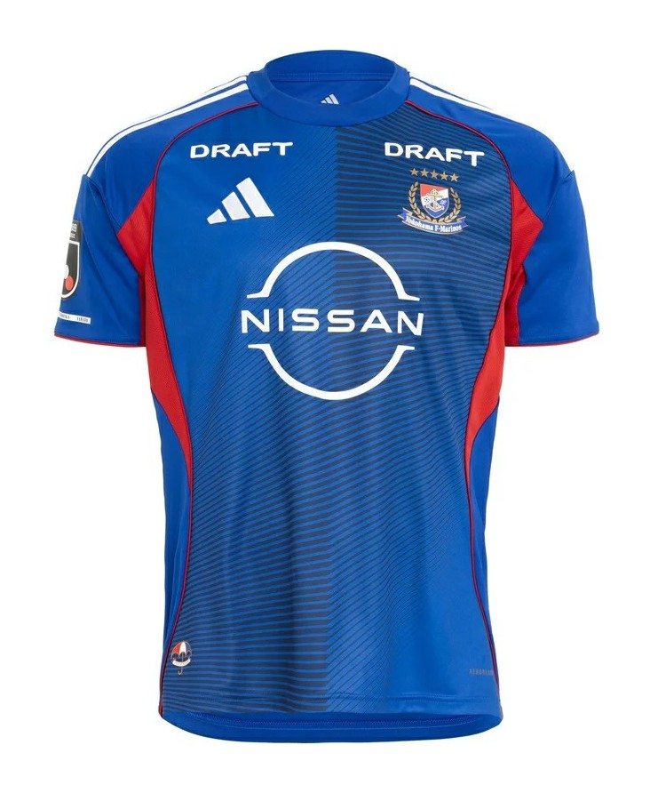 Yokohama F. Marinos Home Jersey 2026/27 front view in blue with tonal striping, red side panels, club crest and Nissan sponsor